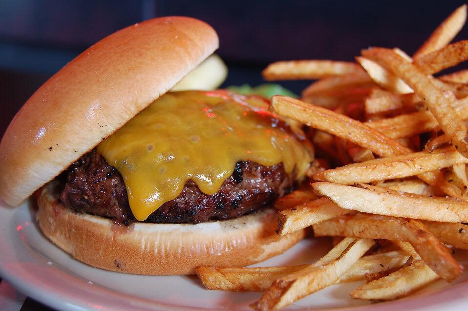 $5 1/4-lb cheeseburger and fries photo
